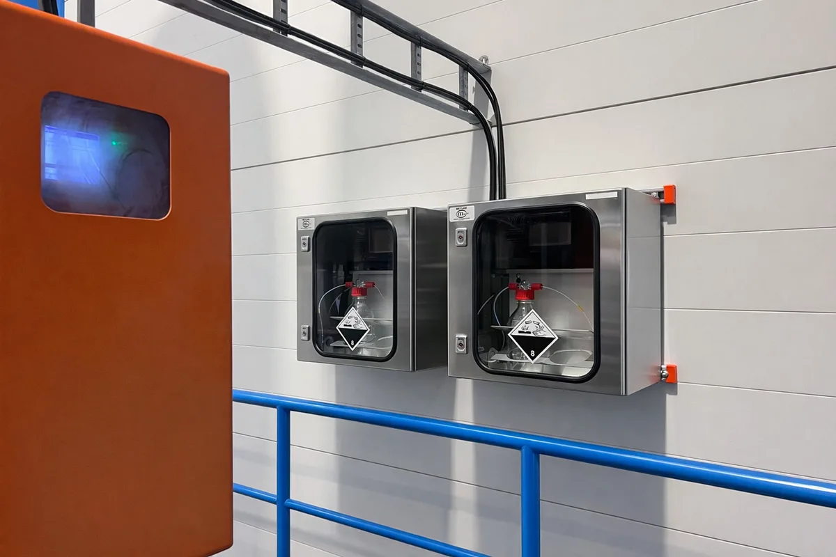 Two C14G2 samplers installed side by side at a European Waste-to-Energy plant — wall-mounted in a compact configuration covering two parallel stack lines.